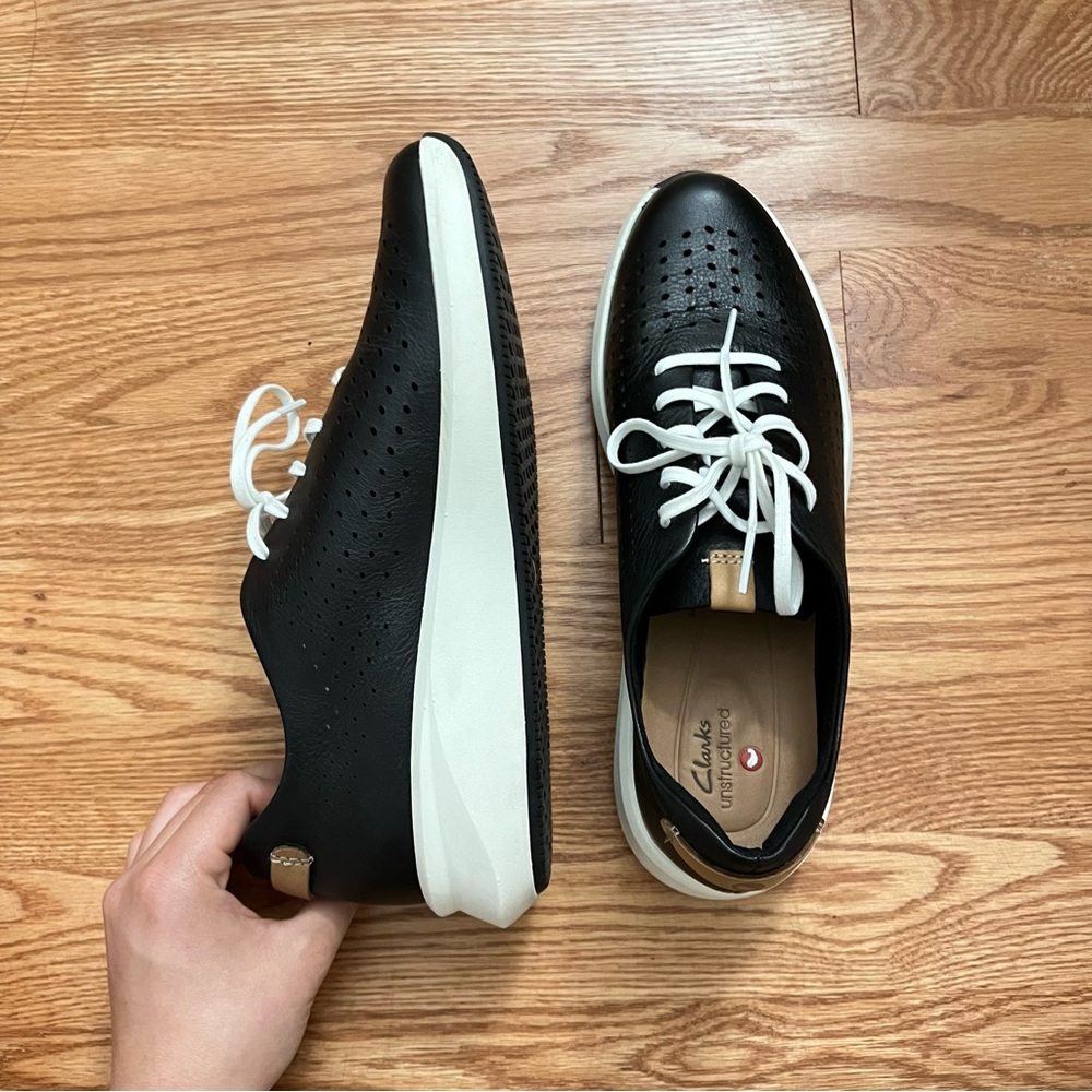 Clarks Un Rio Tie Black Leather Sneaker